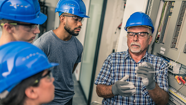 Electrical apprentice learning through hands-on experience