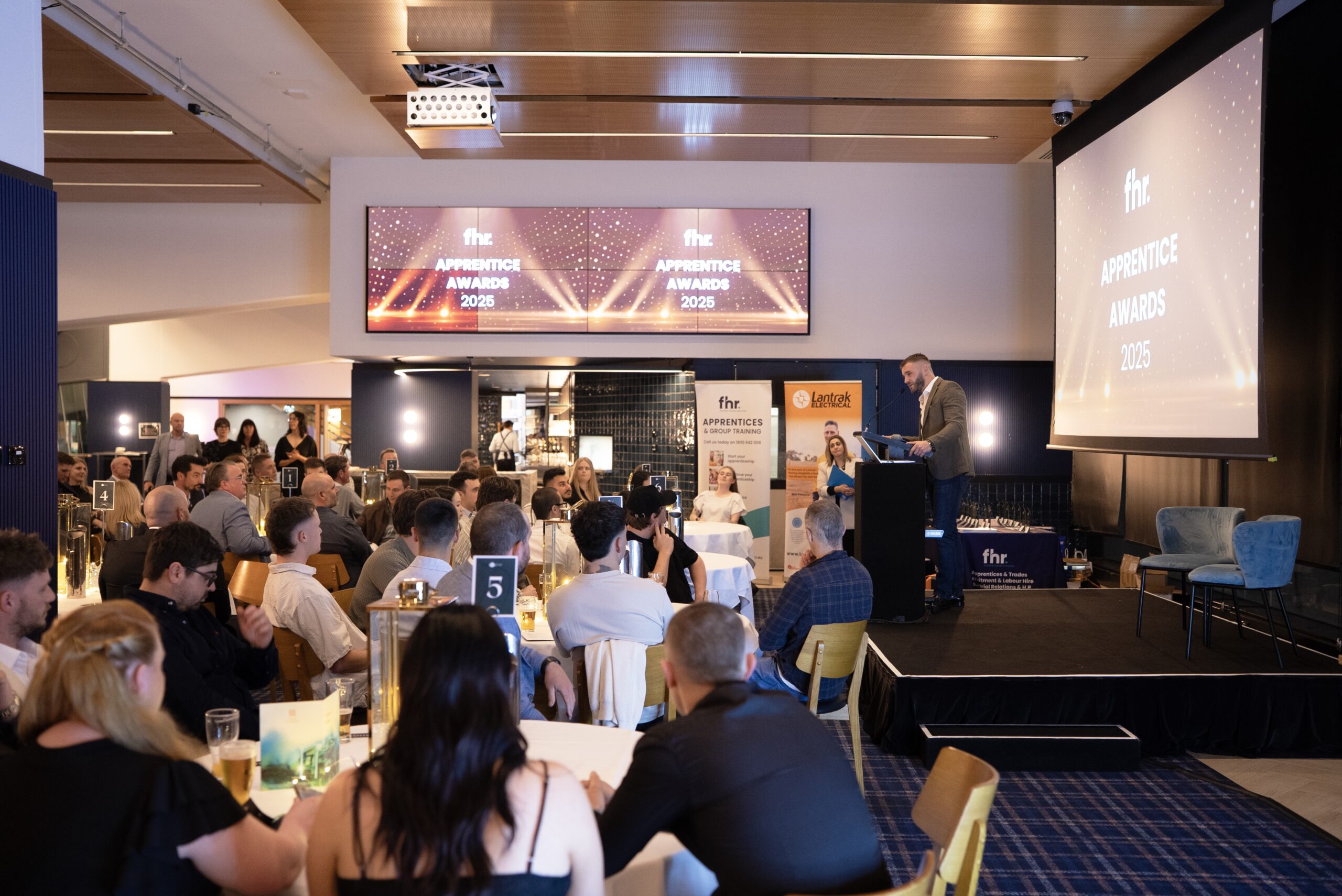 Paddy Courtney presenting at the 2025 FHR Apprentice Awards & Graduation event.